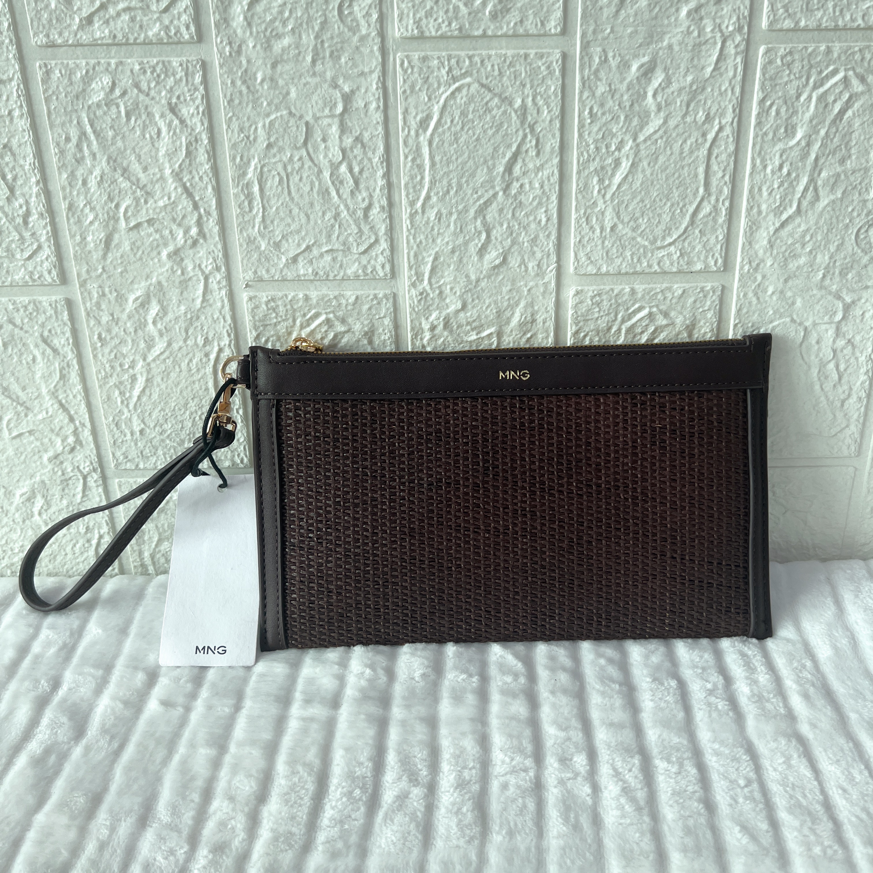 出西班牙单MNG时尚潮流休闲编织百搭手拿包