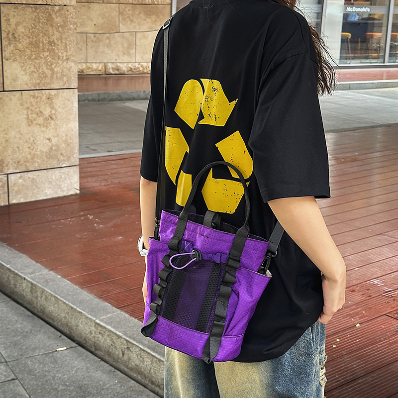 斜挎包男2025新款潮牌大容量单肩包女手机包休闲运动旅行爬山小包