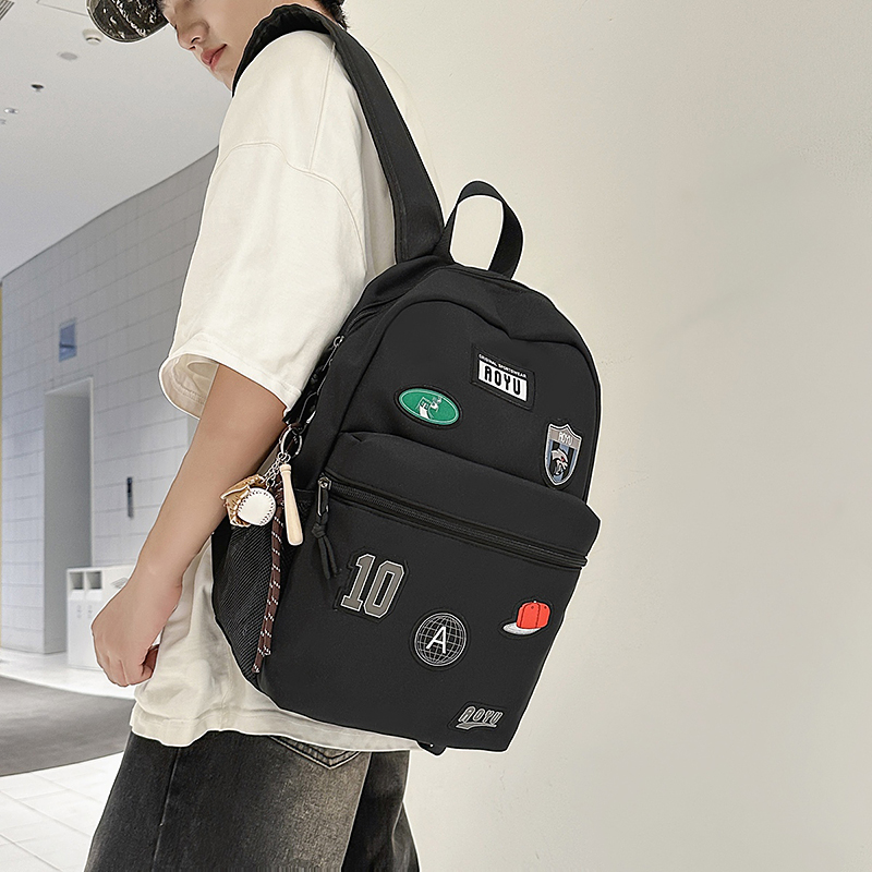 潮牌双肩包男大容量轻便防水旅行背包女初中高中生大学生减负书包