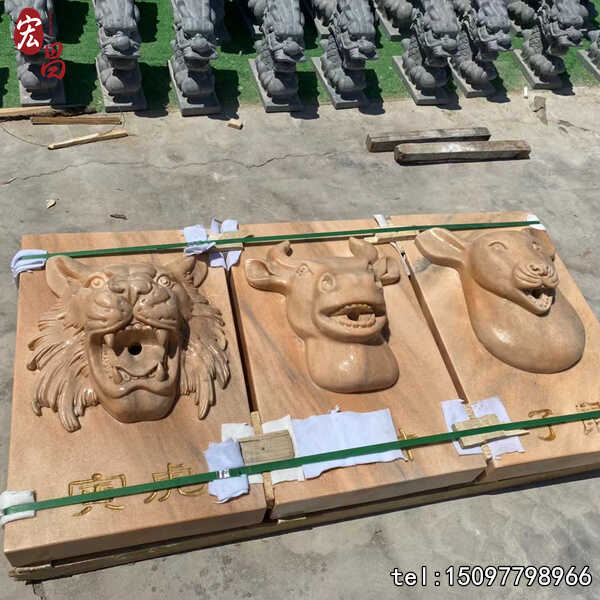 石雕吐水龙头砂岩雕刻别墅庭院水景壁挂雕塑喷泉龙头鱼池喷水石雕