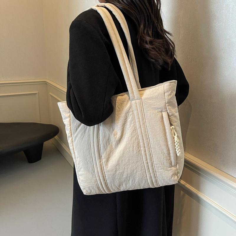 2025新款秋冬简约百搭充棉羽绒包包女多功能大容量休闲通勤托特包