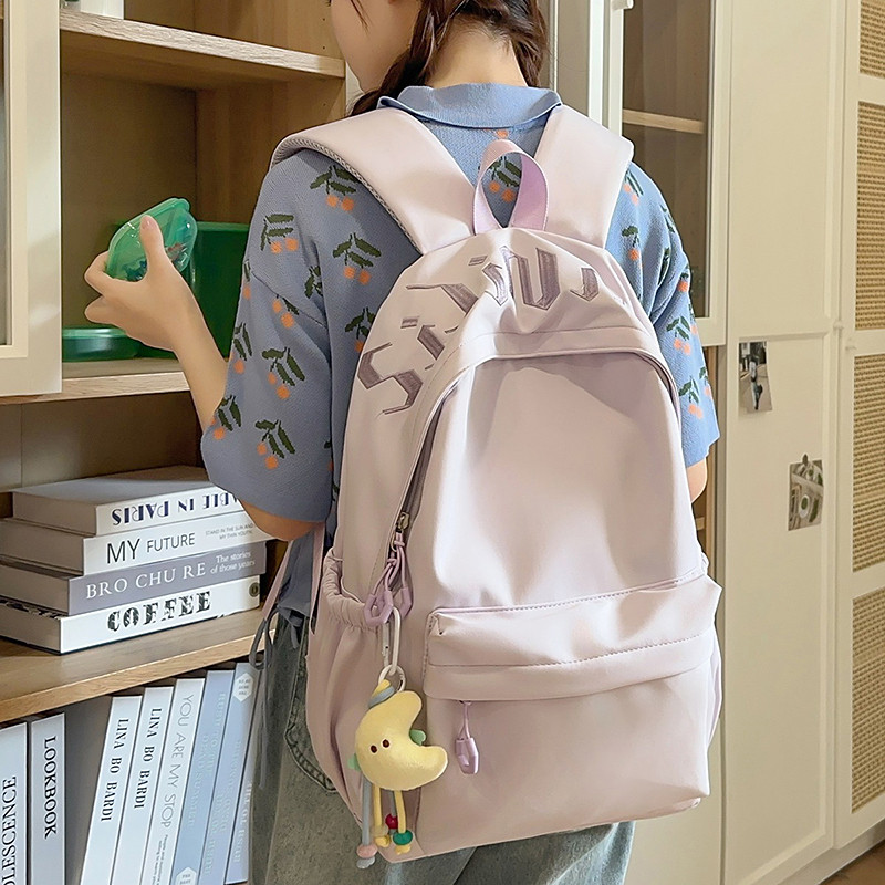 2026新款女大学生旅行双肩包背包初高中生简约紫色轻便大容量书包