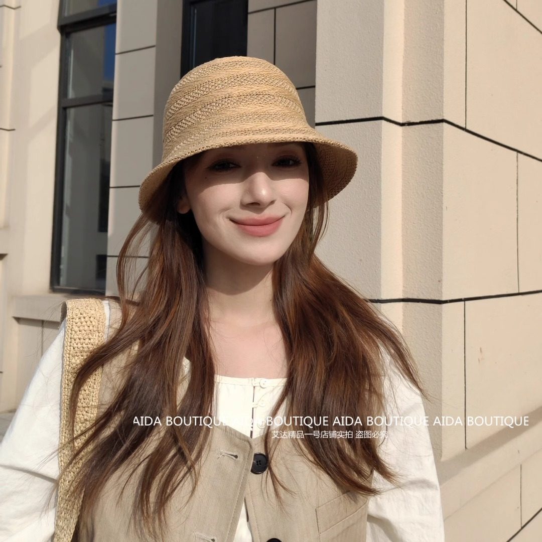 新款草帽女夏季镂空时尚渔夫帽图片
