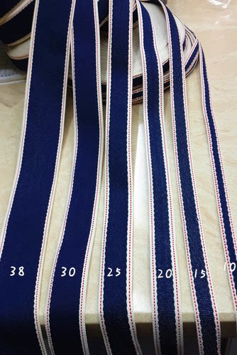 牛仔蓝米边跳点间色涤纶斜纹织带