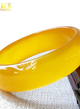 巴西黄玉髓玛瑙手镯加宽加厚蜜蜡黄玉镯子黄龙玉女款货源