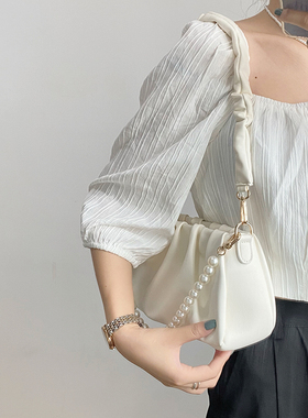 小众包包女春夏2025新款白色褶皱云朵腋下包百搭单肩斜挎包手提包