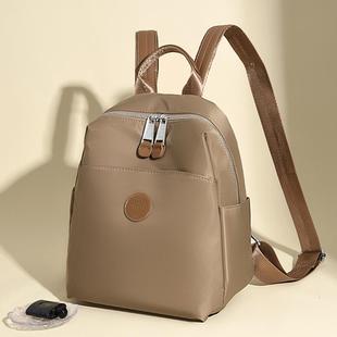 高端奢侈品牌牛津布双肩包2024新款时尚防水旅行包休闲通勤背包轻