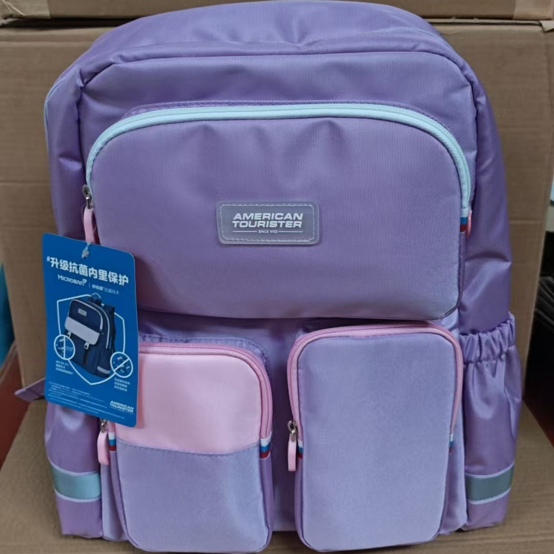 美旅放心书包NK2小学生男女童1-3年级二三四五轻便减负护脊双肩包