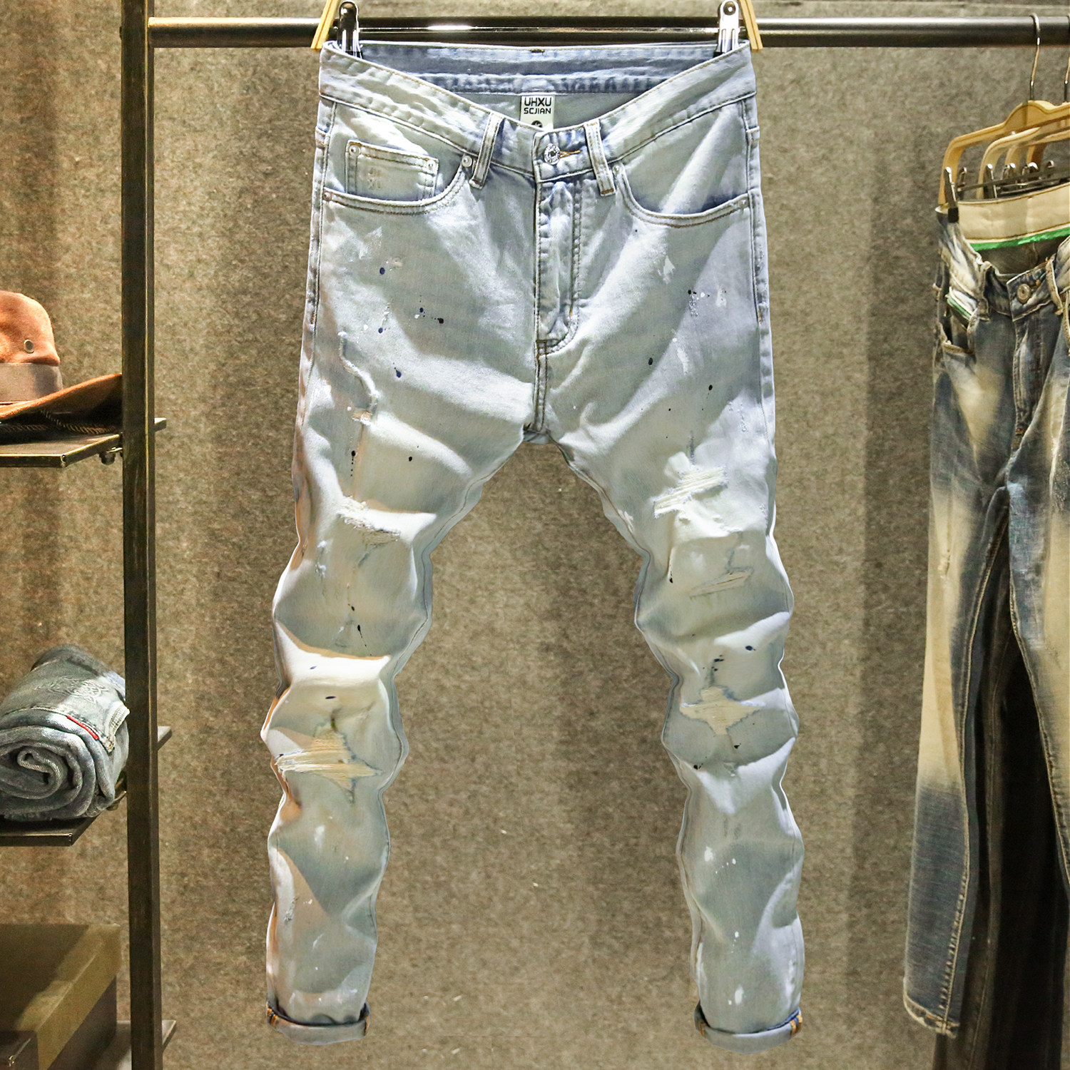 街头潮流时尚泼墨牛仔裤男款浅色破洞补丁裤子男生痞帅修身小脚裤