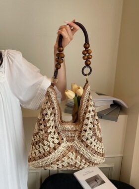 海边沙滩度假草编包包女式2026新款通勤编织单肩包手提托特包大气