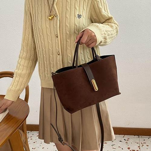 法式独特小众手提包包女2025春夏新款通勤单肩斜挎包大容量水桶包