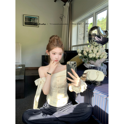 迟伞伞斜肩绑带蝴蝶结露肩上衣