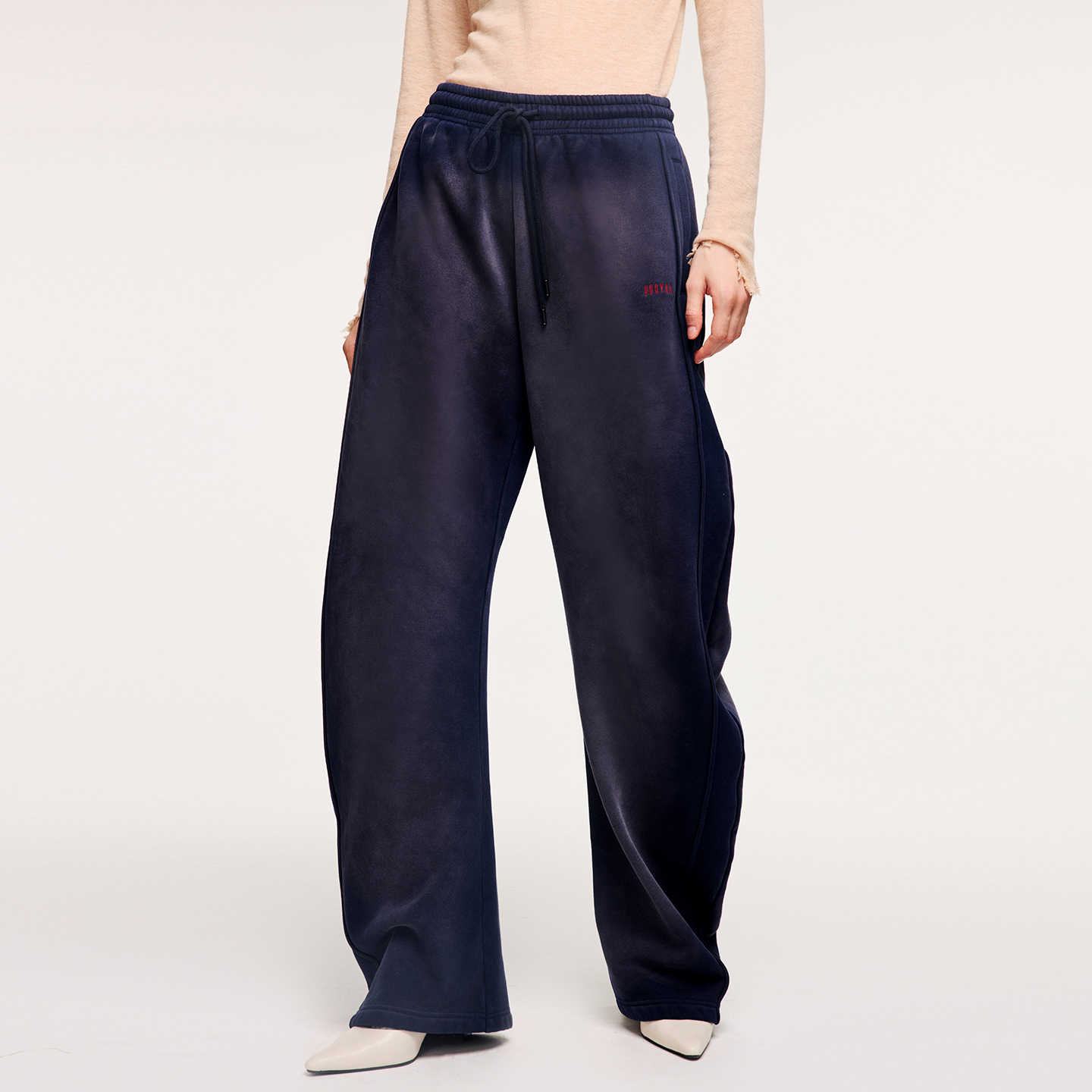 UOOYAA/乌丫洗褪做旧弯刀卫裤