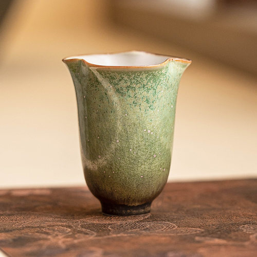 Kiln transformed tea cup, master cup, emerald green starry