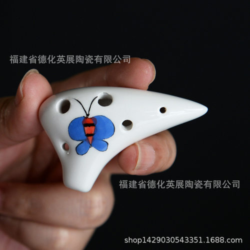Mini ceramic flute with mid to high notes and C tones, trav