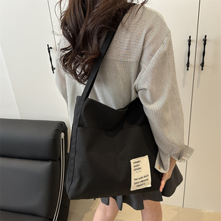 日系斜挎帆布包女夏文艺2026新款学院风学生上课装书单肩包布兜子