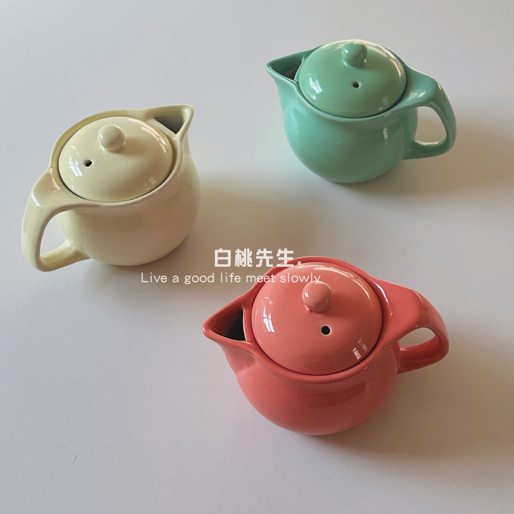 INS风陶瓷带盖茶壶简约纯色马卡龙色好看水壶可爱家居圆形高端