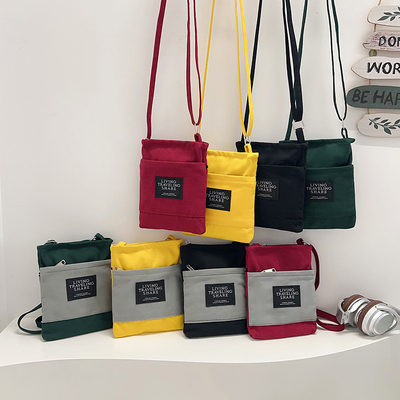 2025新款小众设计单肩斜挎包女简约百搭休闲通勤手机包帆布小包包