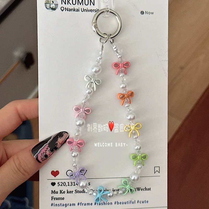 奢华高级感蝴蝶结珍珠链少女百搭ccd相机拍立得包包挂件小众