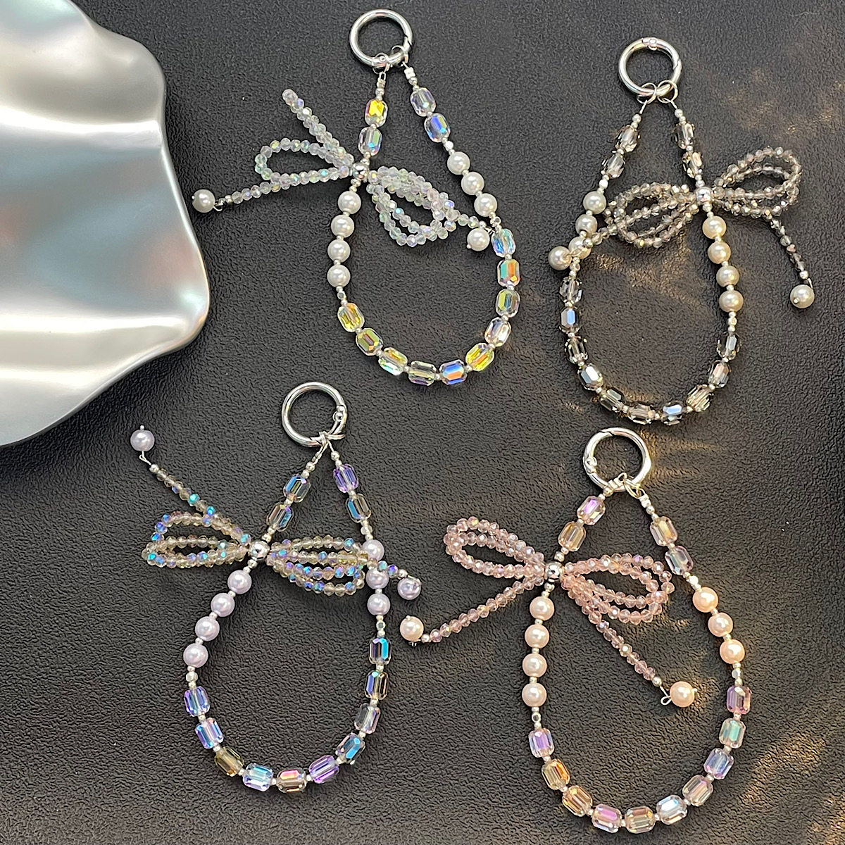 闪钻蝴蝶结链新款串珠挂件多巴胺壳挂链高级精致手提链包