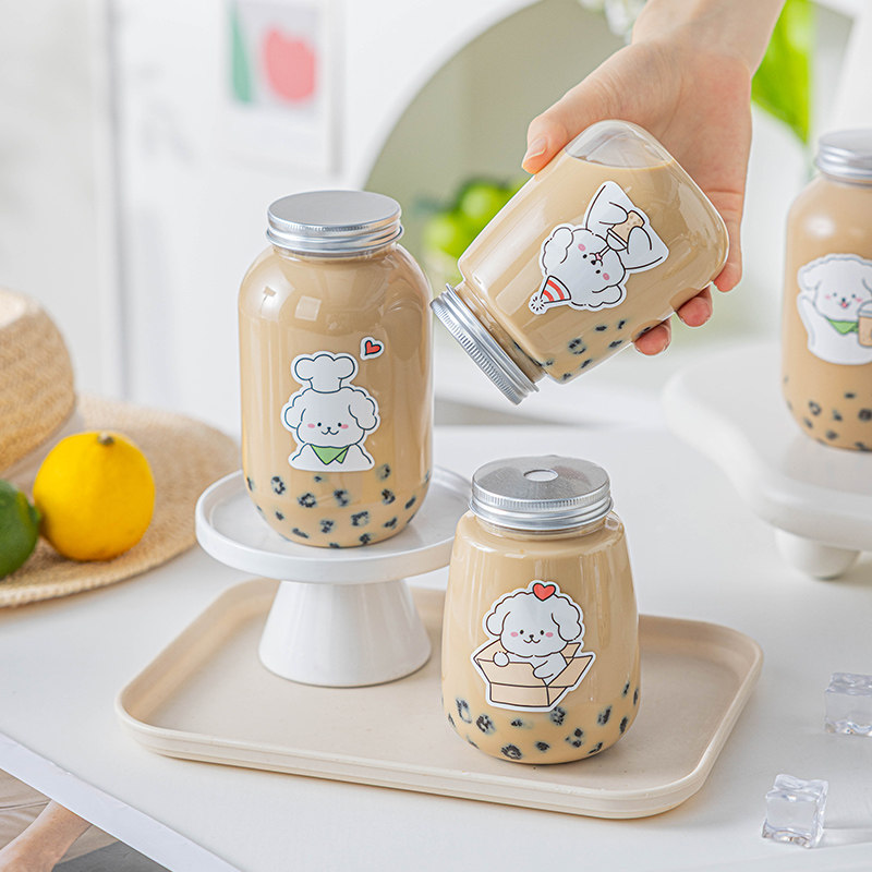 卡通小狗图案奶茶杯透明PET材质带铝盖防漏适合外带打包冷饮使用