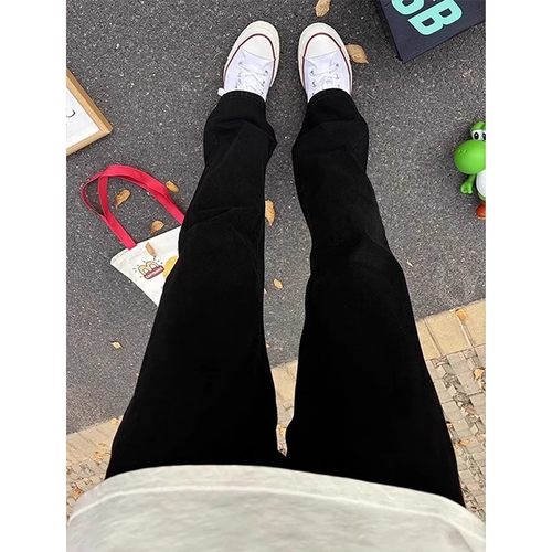 纯黑色弹力弯刀牛仔裤男款秋冬