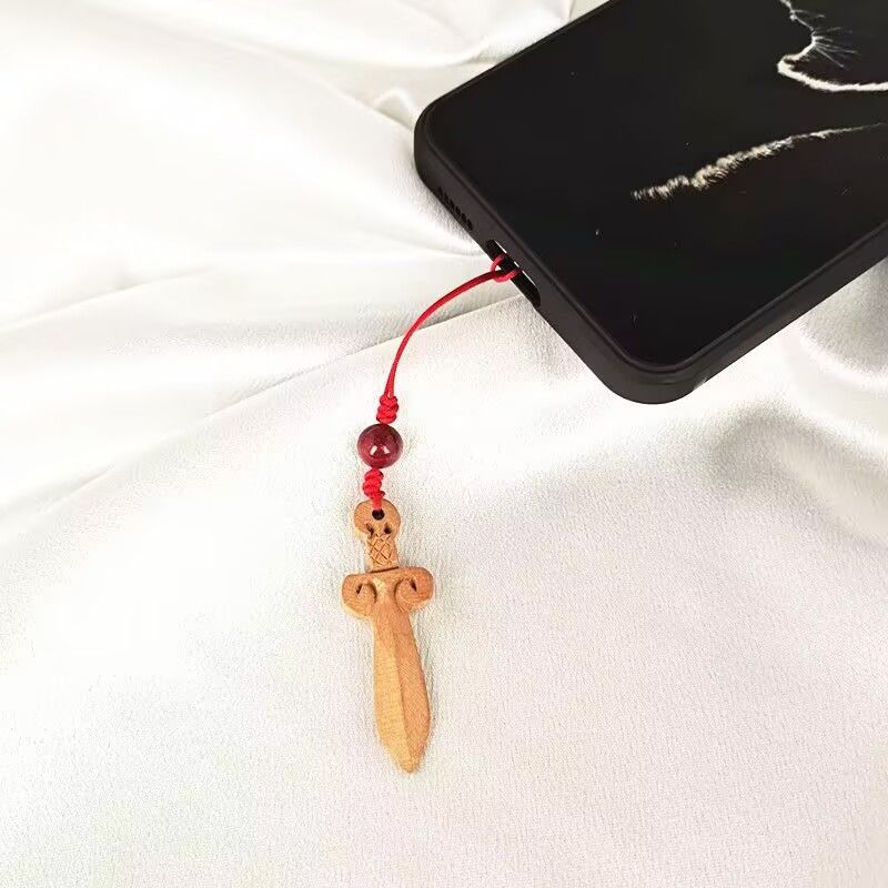 紫金朱砂圆珠手工雕刻桃木剑手机