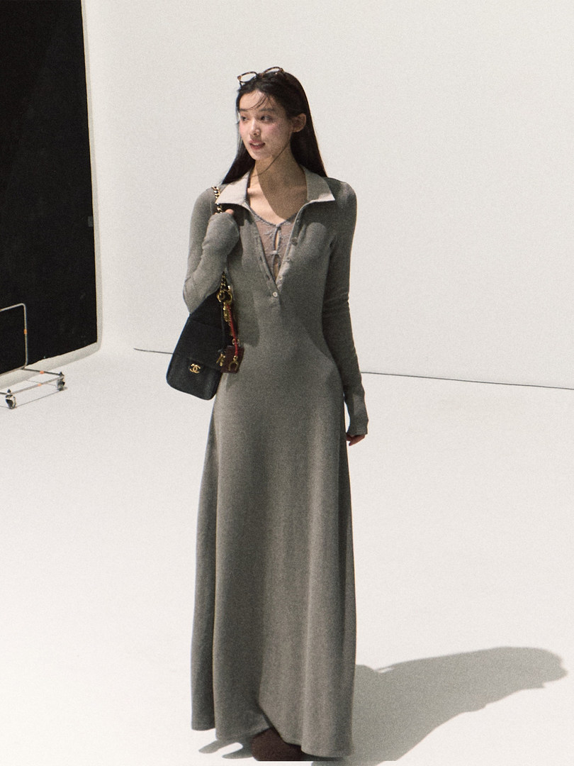 Grey long-sleeve maxi dress worn by a model
