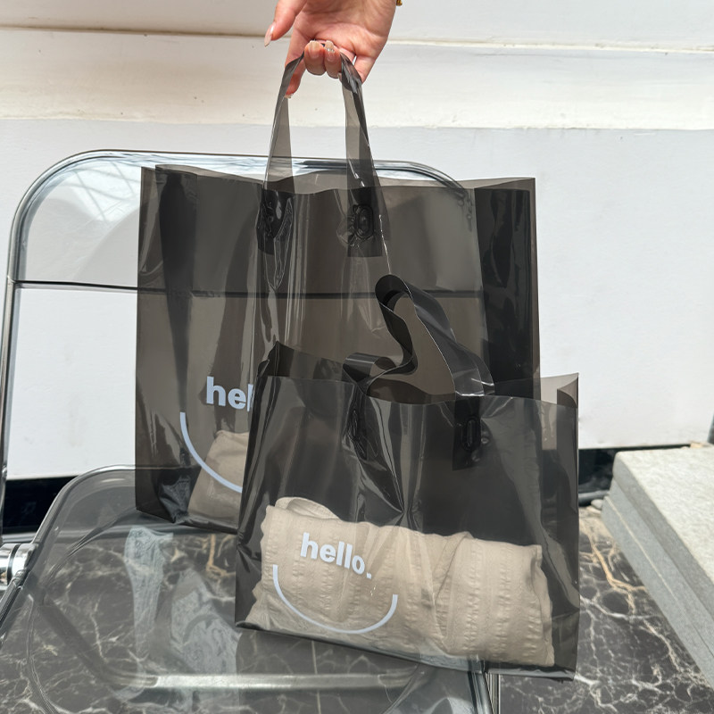 服装店手提袋子女装店购物袋黑色高级感透明塑料加厚包装袋可定制