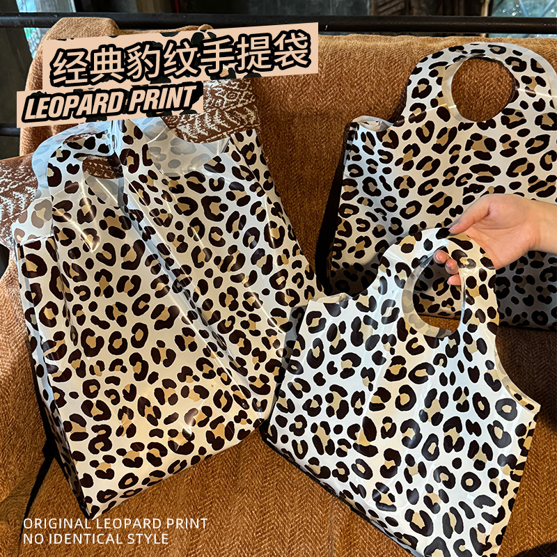 手提袋子服装店塑料包装袋时尚豹纹加厚礼品袋大号装衣服购物袋