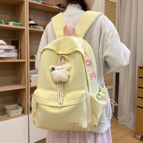 新款纯色简约休闲双肩包可爱少女百搭旅行小背包中小学生上课书包