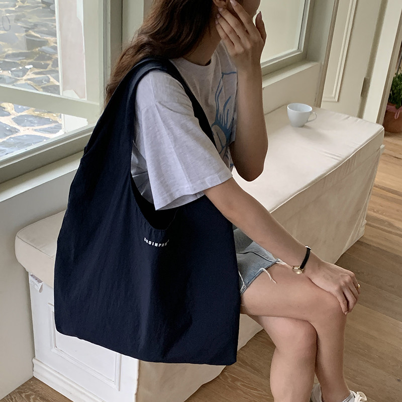 韩版ins简约单肩包女春季速干大容量购物袋帆布包月牙手提托特包