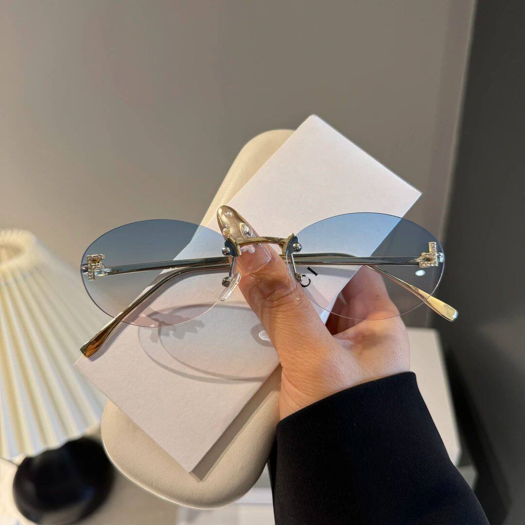 新款镶钻F椭圆无框太阳镜欧美明星ins博主街拍同款高级墨镜