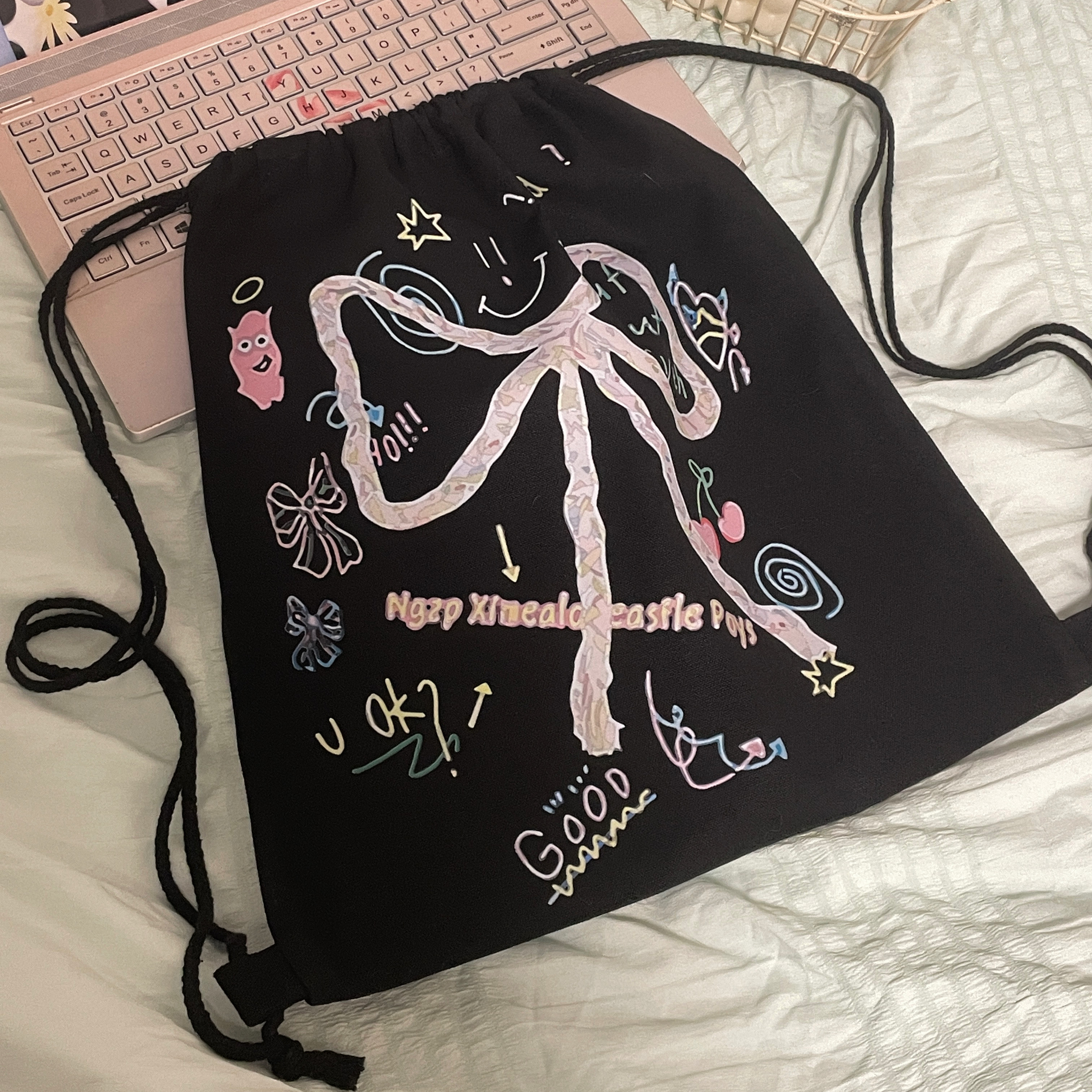 黑色蝴蝶结印花双肩包包