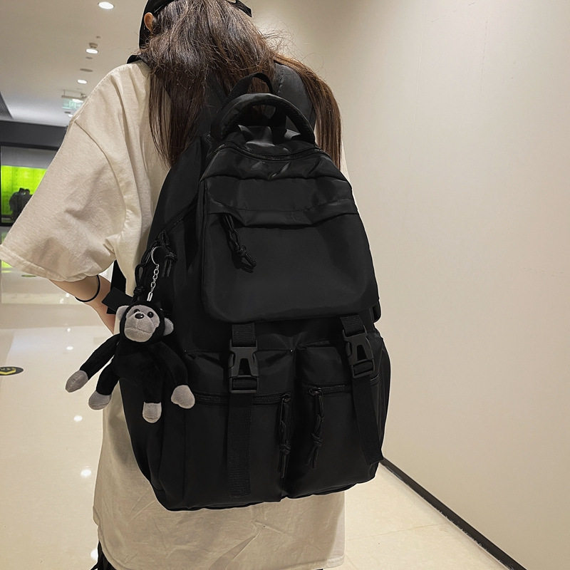潮酷纯黑书包多袋大容量休闲双肩包时尚新款初高中男女学生背包