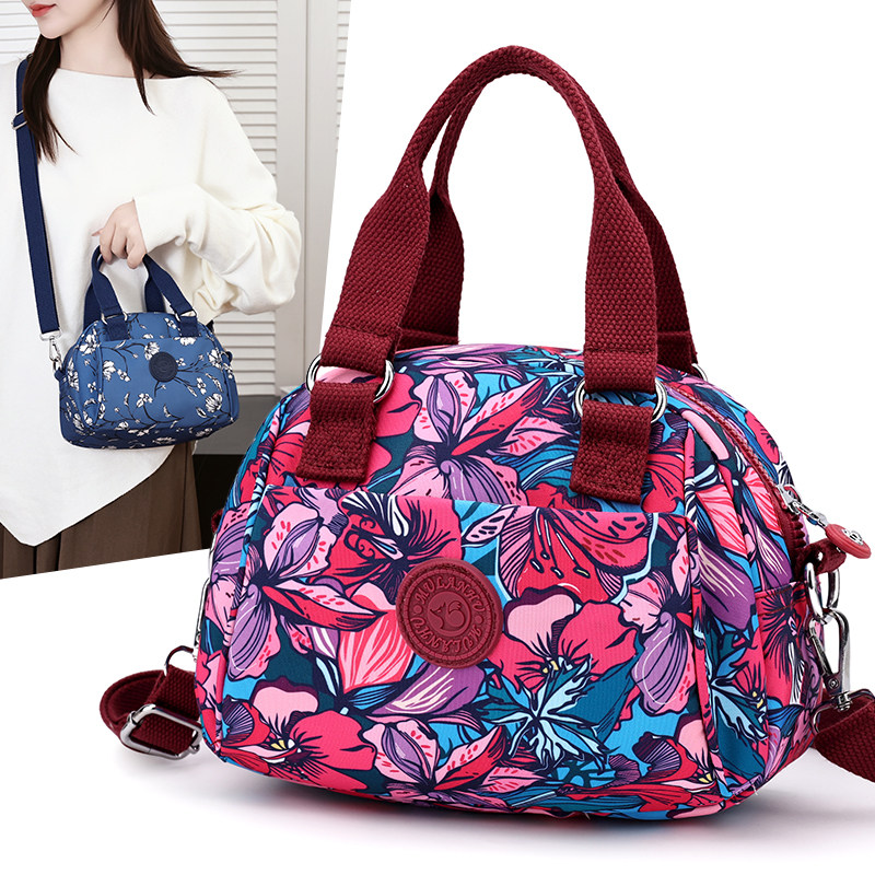 新款中年妈妈包老年人休闲手提买菜包妇女小拎包手机零钱贝壳包女