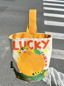 新款帆布包水桶包大桔大利印花随身小手提包妈咪包便当外出小拎包