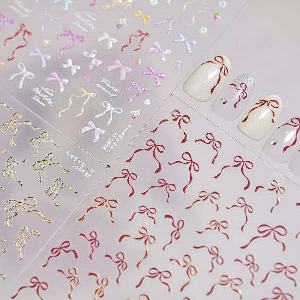 烫金红色飘带蝴蝶结美甲贴纸贝壳光碎花蝴蝶结背胶防水指甲贴装饰,彩妆/香水/美妆工具,美甲工具,淘宝优惠券,粉丝福利购,淘宝优惠卷