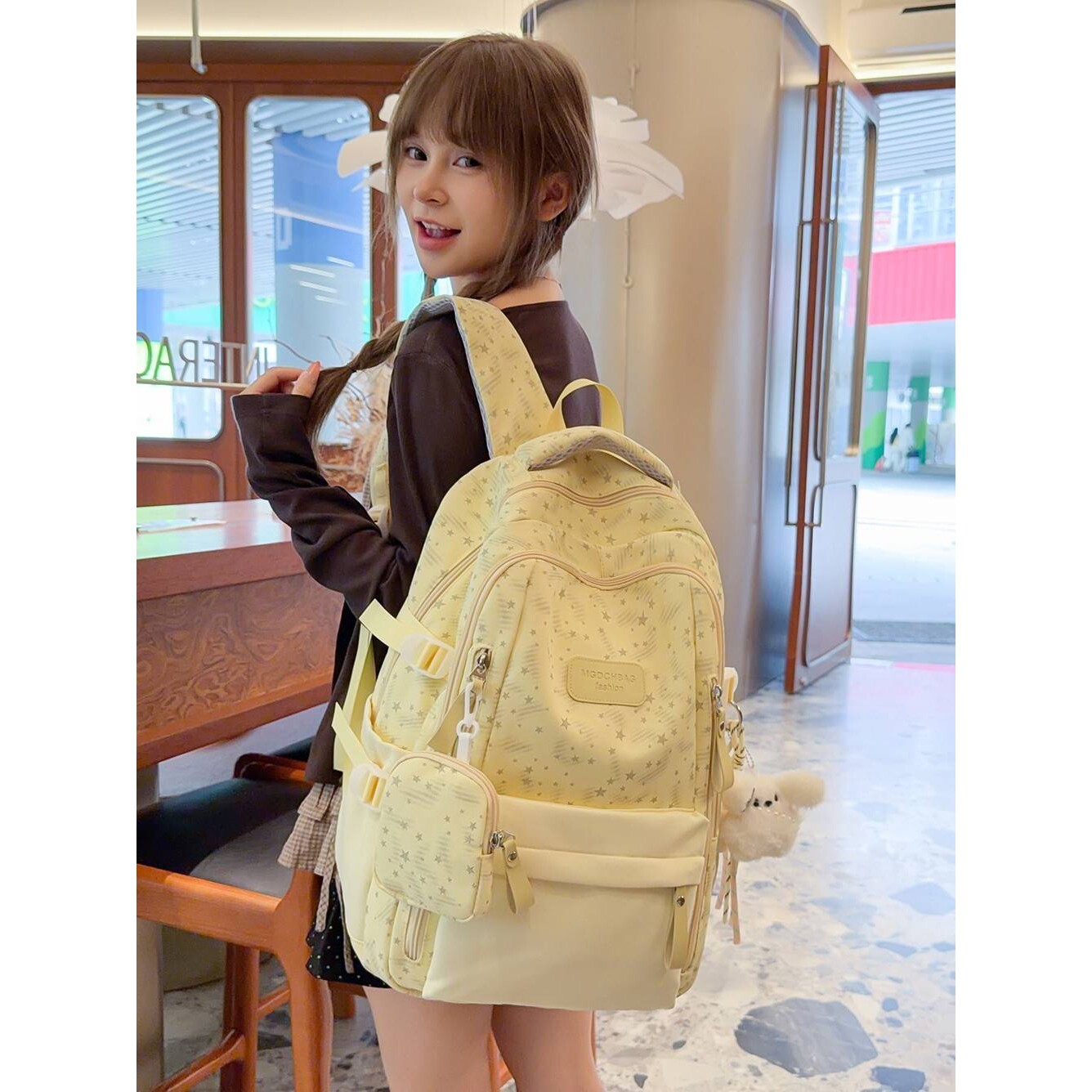 官方梦幻星星印花少女休闲双肩包学生党上课周末短期游玩高颜值书 - 实物图