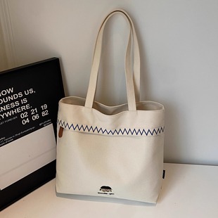大容量刺绣小众帆布托特包包女2026新款 学生通勤百搭单肩包 潮韩版