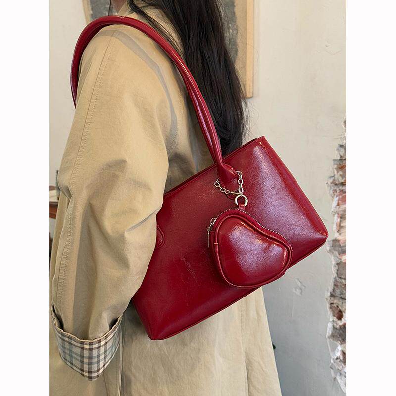 韩国小众高级感长柄单肩腋下包新款大容量爱心耳机包通勤托特包