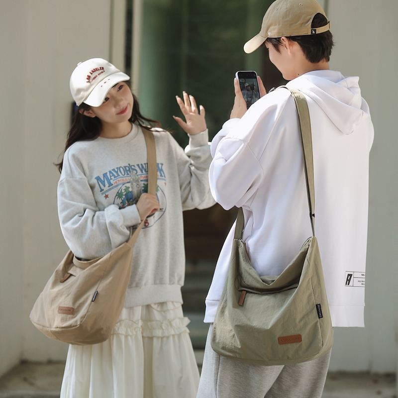 2025新款日系HOBO包男女单肩包大容量轻便布包百搭情侣斜挎包