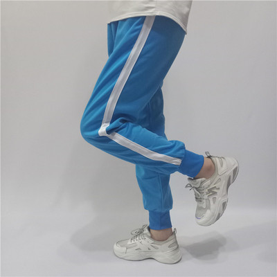 男女一道白杠天蓝色束腿校服裤子
