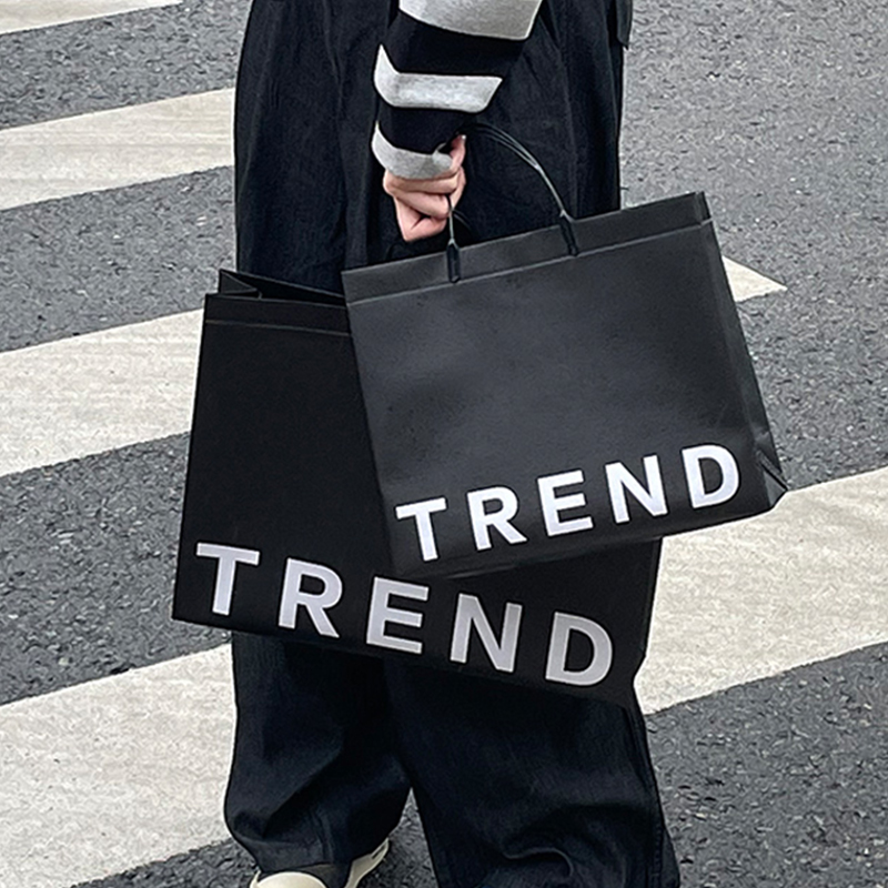 黑色高级服装店袋子定制LOGO男女装店用环保无纺布礼品手提袋耐用
