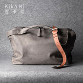 kikani吉卡尼商务旅行包男真皮手提旅行袋通勤大容量邮差包斜挎包
