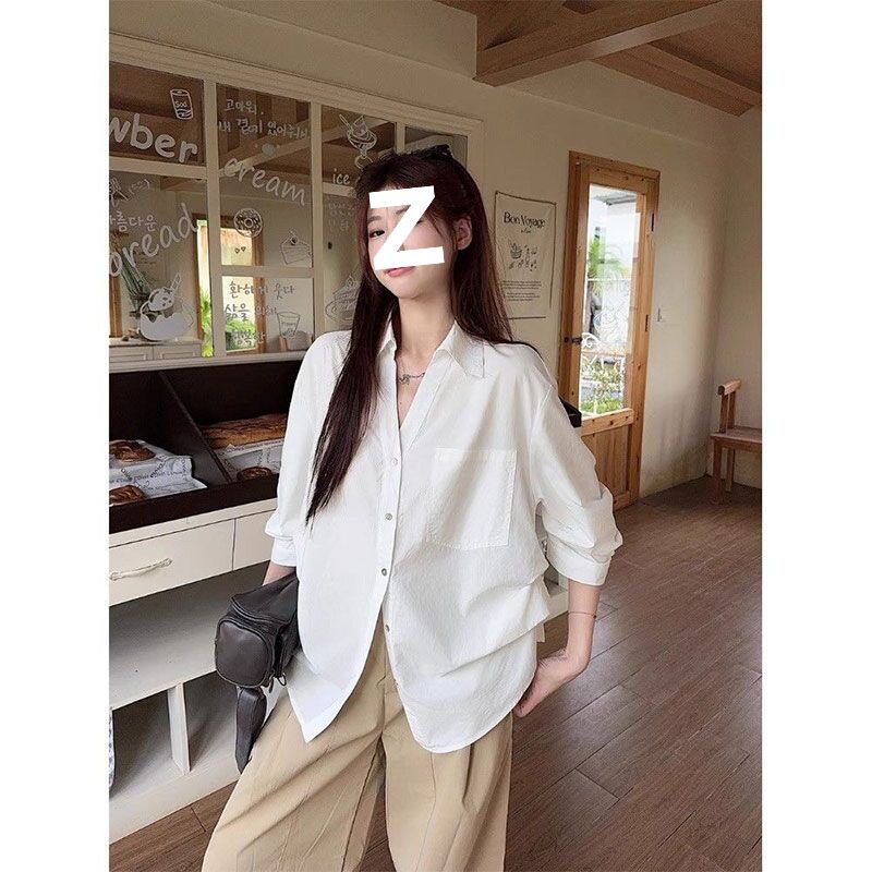 韩系设计感V领中袖白色衬