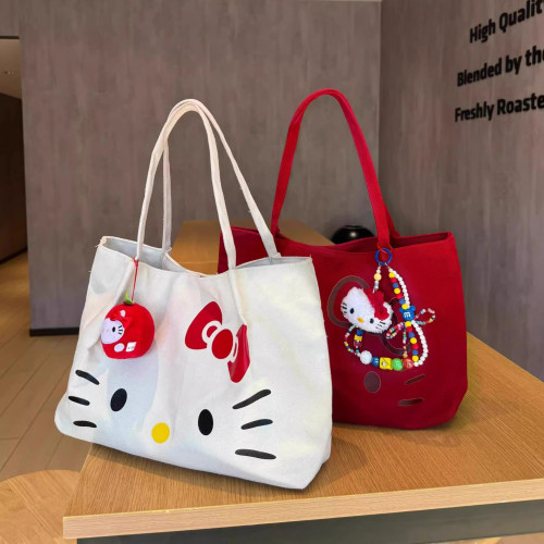 手提帆布包女夏大容量2025超火单肩通勤托特包学生HelloKitty布袋
