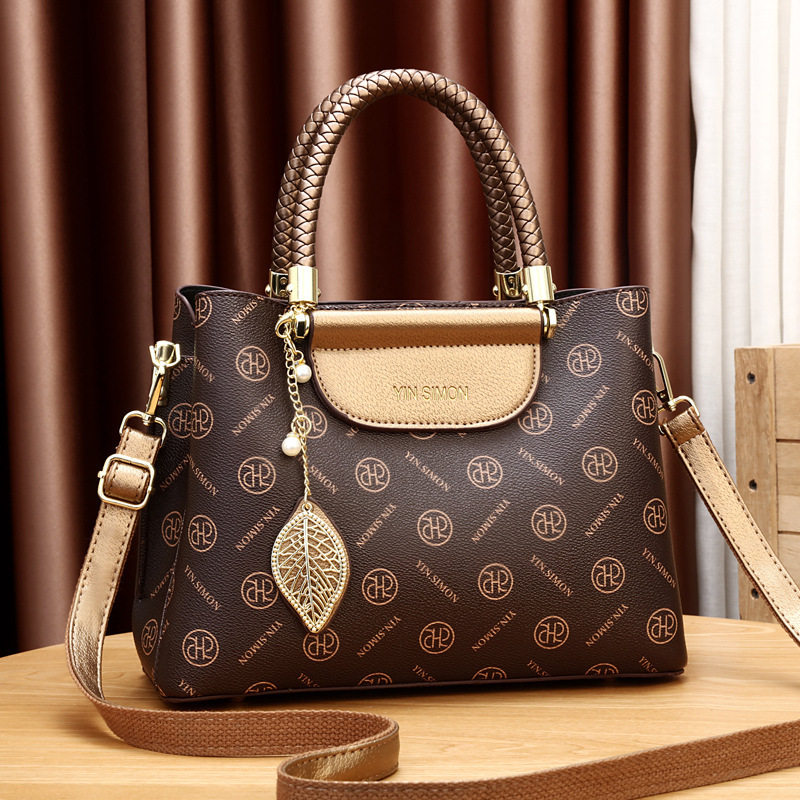 轻奢高级感2025新款大容量女士手提女包单肩斜挎包中年大气妈妈包