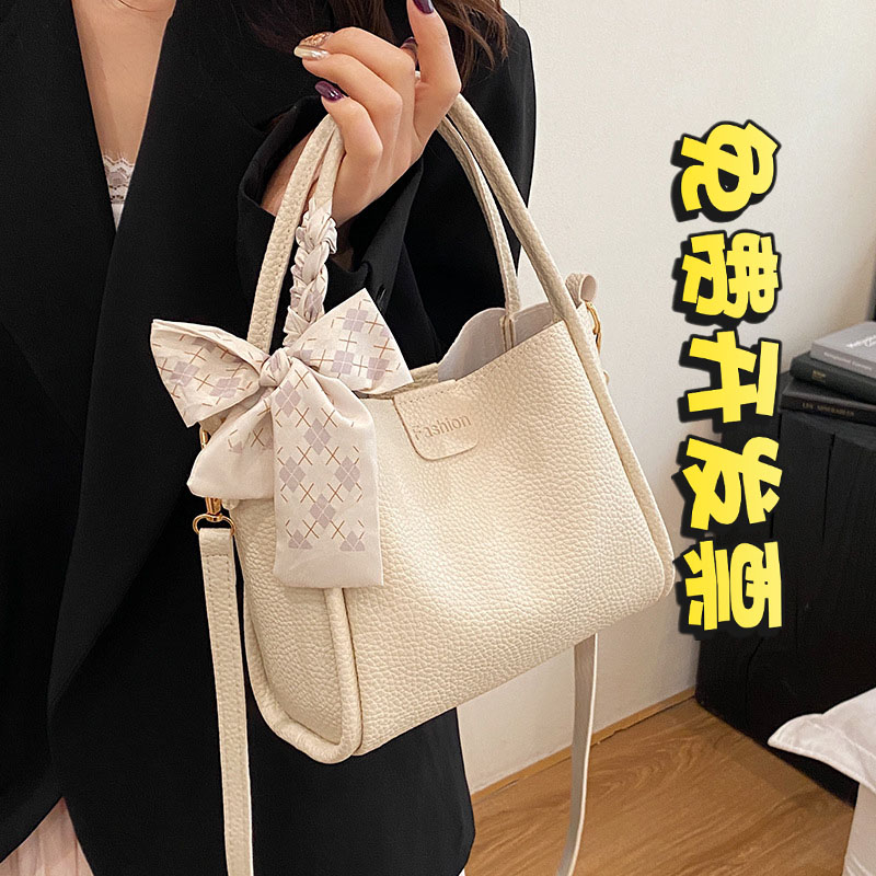 手提包包女2025新款春夏季小众水桶包通勤百搭单肩斜挎包流行女包