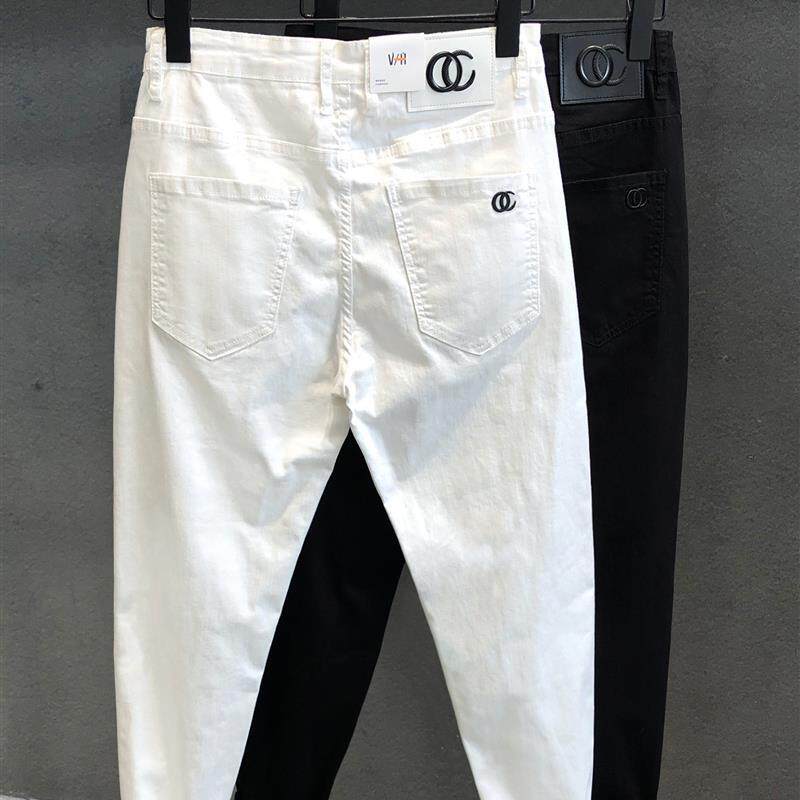 夏季新款休闲弹力白色牛仔裤男士修身小脚韩版潮流高端九分裤子